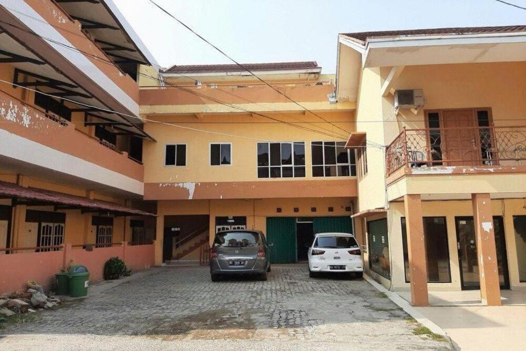 Oyo 2025 Wisma Musdalifa Palembang Bagian luar foto